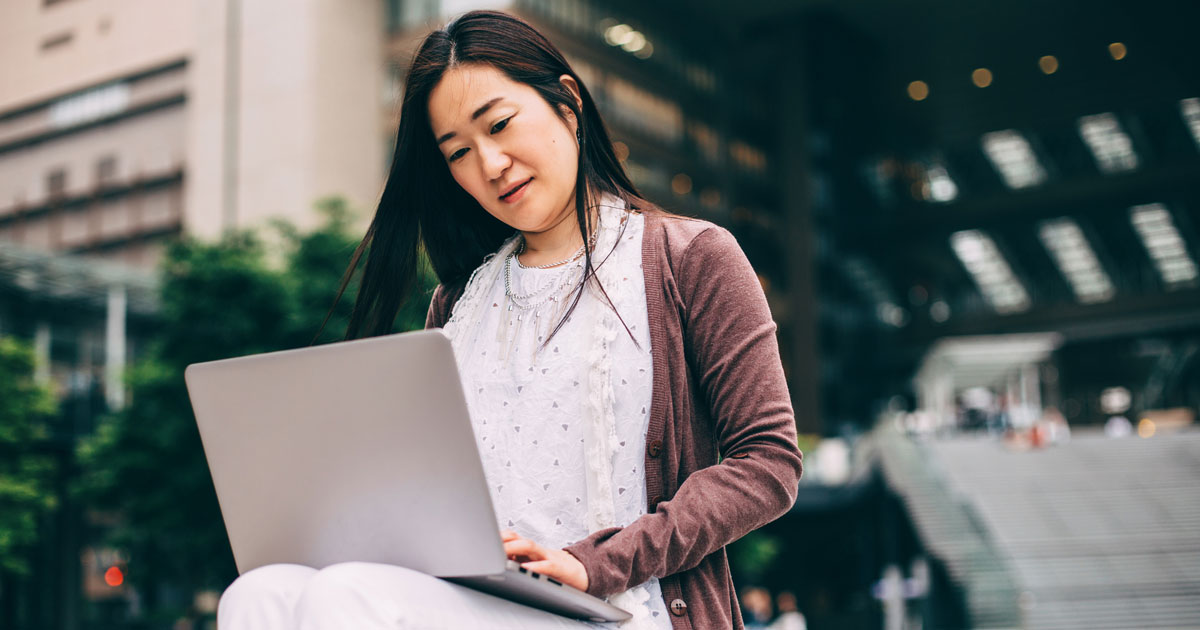 Woman is on her laptop